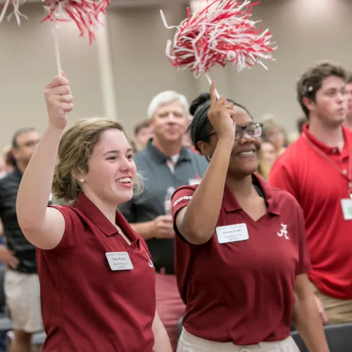 Student orientation leaders welcome families to campus